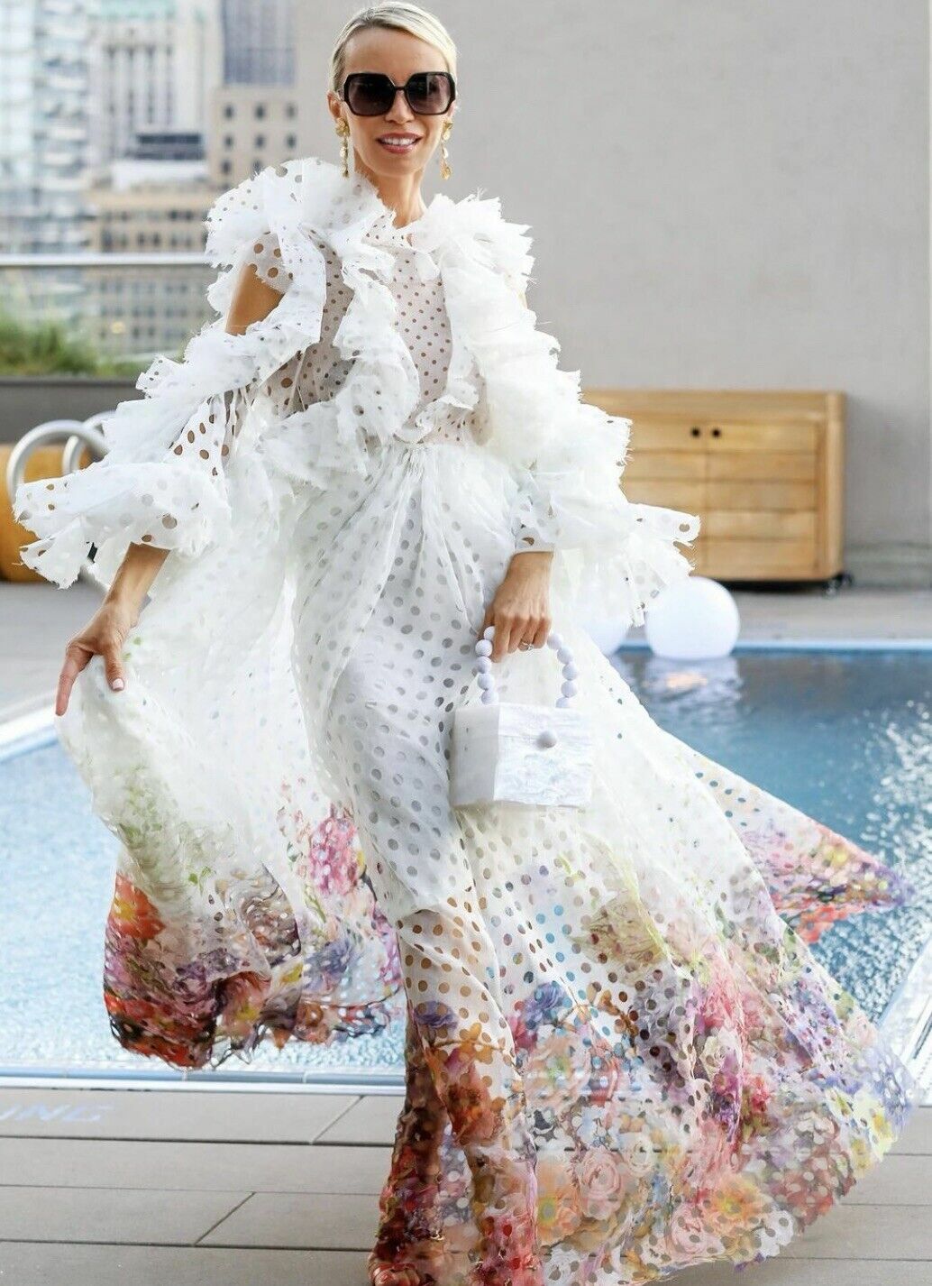 zimmermann laser cut dress Look 25: The Natura Lasercut Halter Dress styled with Zimmermann Orb  Earrings and Zimmermann Drew Pump 95 from Spring 24. #NATURA #ZimSpring24  #PFW #zimmermann